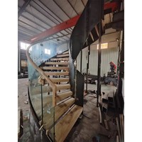 Escalier courbé commercial de grande envergure pour hall d'hôtel, escalier en arc de luxe en acier structurel avec garde-corps en verre