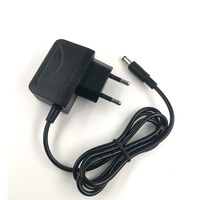 Enchufe DE LA UE 12V 1A Proveedor de energía de seguridad certificado Enchufe europeo 12W Conmutación STB Adaptador de corriente