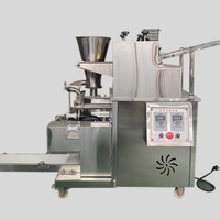 Machine à samosas et raviolis motorisée automatique à haute efficacité en acier inoxydable de qualité alimentaire pour la formation de curry puffs, idéale pour les restaurants
