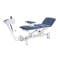 Table de traction pour traitement Dispositif de traction de la colonne lombaire à 4 sections Lit de physiothérapie Table de chute chiropratique Canapé d'examen