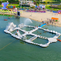 Parc aquatique gonflable géant personnalisé, équipement modulaire de parc aquatique pour lac et mer