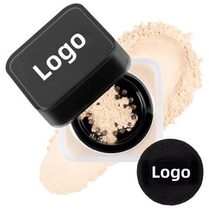 Luxury brand highlights matte loose powder with a small powder puff for controlling oil and providing organic setting. - Product Image 3