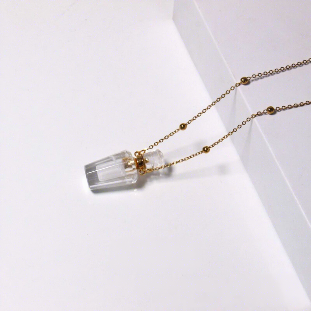 Bouteille en cristal blanc forme-or