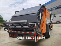 Camion à ordures compacteur à chargement arrière HOWO 4x2 5000L, diesel manuel, 2-20 tonnes, Euro 1, état neuf, pour les industries de la restauration