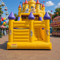 Château gonflable commercial jaune avec toboggan, structure de saut pour enfants, idéal pour la location événementielle