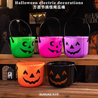 Accessoires décoratifs d'Halloween en gros en stock pour l'exportation : citrouilles violettes, noires, oranges, vertes, roses, et seaux à bonbons avec smiley