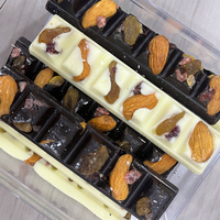 Barre chocolatée aux noix en gros, bonbons au chocolat, chocolat aux amandes et raisins secs