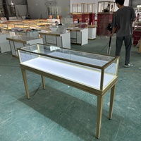 Vitrine de présentation de bijoux en acier inoxydable de luxe, en MDF, avec éclairage, pour comptoir de magasin et salle d'exposition
