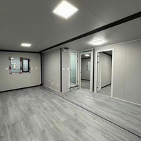 Maison conteneur extensible de luxe moderne entièrement personnalisée avec toit triangulaire, 2 chambres, cuisine, salon et salle de bain