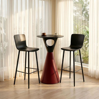 Table basse circulaire moderne minimaliste à pieds hauts pour l'extérieur, idéale pour les cafés et les espaces de loisirs