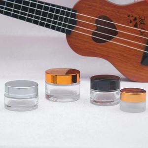 Frascos de Vidrio Negro para Crema Facial - Envases para el Cuidado de la Piel, Frascos Redondos Metálicos Vacíos con Logotipo Personalizado Serigrafiado y Tapas Doradas de 10g-50g - Product Image 1