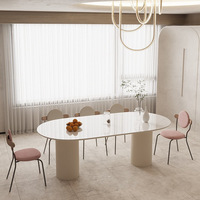 Table de salle à manger ovale en dalle de roche de luxe, style colonne romaine, couleur crème laiteuse, pour restaurant et maison