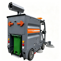 Balayeuse de rue ZMT E-33 G40 avec cabine entièrement fermée et réservoir auto-vidant, dotée d'un pistolet de lavage haute pression