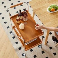 Table basse mobile minimaliste en bois massif avec chariot de rangement à roulettes, cadre métallique vintage, petite étagère d'appoint pour canapé, salon et salle à manger