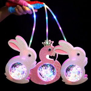 Lanterne à bulles LED portable en forme de lapin ou de dinosaure pour enfants, idéale pour la décoration des stands de marché nocturne - Product Image 1