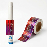 Étiquettes d'emballage avec aspect réfléchissant rouge-violet et impression de texte sur rouleaux pour l'identification des produits