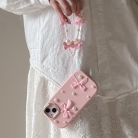Coque de téléphone portable tendance avec nœud perlé et chaîne pour iPhone 16 15 17 Pro Max, couleur bonbon, en TPU, protection arrière