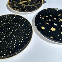 Assiettes de luxe en céramique noire et or, motif ciel étoilé marbré géométrique, assiettes de présentation en porcelaine pour la décoration de table de fête