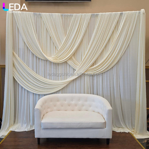 ฉากหลังผ้าสีขาวเรียบหรูสำหรับงานแต่งงานในร่ม LEDA พร้อมผ้าประดับตกแต่ง - Product Image 1