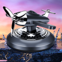 Avion rotatif à énergie solaire Parfum de voiture Désodorisant pour voiture Diffuseur de parfum d'avion Tableau de bord