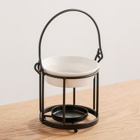 Nouveau brûleur à huile essentielle en céramique noire dorée, diffuseur de parfum, chauffe-cire décoratif avec poignée