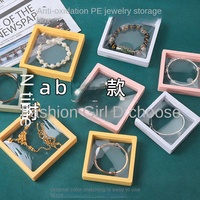 Boîte de rangement pour bijoux avec plateau flottant en film PE transparent, estampage à chaud doré imprimé, forme ronde/carrée, boîte de présentation pour ongles portable