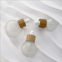 Mini forme de boule de verre ronde 10ml 20ml 30ml 50ml Volume pour huile essentielle Essence liquide crème pour le visage flacon compte-gouttes givré