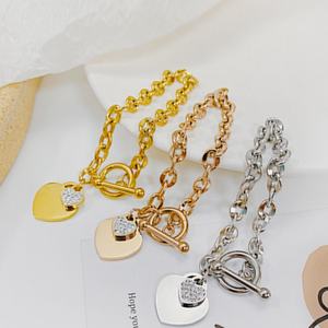 Pulsera de Acero Inoxidable 316L con Corazón de Circonita Chapada en Oro de 18k para Mujer - Product Image 5