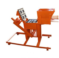 Presse manuelle à briques d'argile à bas prix, machine de fabrication de blocs d'argile emboîtables, cadre en acier haute sécurité à vendre au Kenya