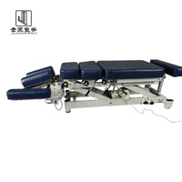 Table de massage et de traction chiropratique professionnelle moderne de nouvelle conception avec cadre métallique et 3 moteurs pour hôtels et salles de sport
