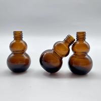 ShanDong 10ml bouteille d'huile essentielle en verre Double forme de gourde en ambre avec bouchon à vis en aluminium surface d'estampage à chaud bien reçue