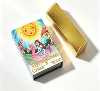 Jeu de cartes de tarot en gros OEM, impression personnalisée économique, cartes de tarot or et noir avec coffret rigide et guide, jeux de cartes