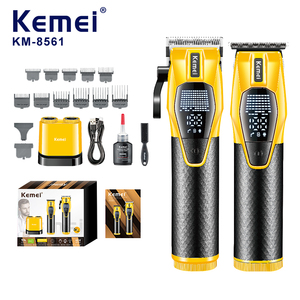 Kemei Km-8561 Pro 2500mah Batterie Li-ion Moteur haute vitesse 7300 tr/min Ensemble de tondeuse à cheveux 2 en 1 Chargeur sans fil Dock Kit de tondeuse à barbe - Product Image 1