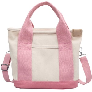 Sac fourre-tout en denim uni résistant à l'eau et écologique avec broderie et fermeture éclair – Choix de mode durable et portable, éthique - Product Image 1