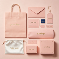 Boîte carrée portable en carton ondulé personnalisée de luxe pour l'emballage de vêtements pour bébés, boîtes cadeaux élégantes en carton