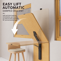 Support mural ultra-fin pour table pliante, avec amortissement doux et système de levage.