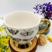 Offre Spéciale Papillon Soie Écran Motif Décalque Plaquent D'or Poignée Pieds En Céramique Tasse
