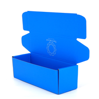 Caja de Cartón Corrugado con Lámina Azul Personalizada para Camisetas, Embalaje para Envío de Ropa, Proveedor Especializado en Embalaje Personalizado para Marcas de Ropa
