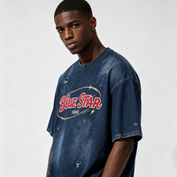 T-shirt Oversize Effet Vieilli Kornit DTG avec Motif Vintage Crack Star Script sur Toute la Surface et Bas Déchiré – Coupe Ample Vintage