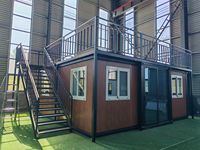 Module préfabriqué extensible en kit, maison conteneur de 40 pieds, utilisation pour bureau ou bâtiment, panneau sandwich en acier, énergie solaire, design moderne