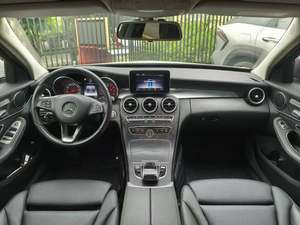 <span class=keywords><strong>Occasion</strong></span> <span class=keywords><strong>Mercedes</strong></span>-Benz <span class=keywords><strong>Classe</strong></span> C Lumière Turbo Automatique Cuir Sièges Direction Gauche Pneus R17 Galerie de Toit en Métal Entraînement FWD Caméra Arrière ACC - Product Image 5