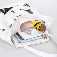 YIFAN Sac fourre-tout en coton à long manche pour femmes Shopper de poche à fermeture éclair réutilisable écologique avec logo personnalisable et motif géométrique