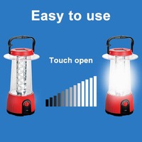 Lampe de camping solaire LED rechargeable en gros d'usine avec banque d'alimentation solaire et lanterne USB pour extérieur en plastique