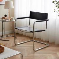 Fauteuil minimaliste de style nordique, chaise incurvée en tube d'acier inoxydable, chaise de salle à manger en similicuir