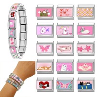 Accessoires de bracelet à breloques italiennes tendance en acier inoxydable avec de jolis éléments chat, papillon et fleur dans des tons roses
