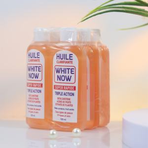 Minyak Pemutih Super Cepat Triple Action Oil Whitening L'huile Super Clarifiante WHITE NOW Concentrés De Carotte Et - Product Image 1