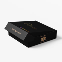Boîte cadeau personnalisée noire avec couvercle et base magnétiques, intérieur doublé blanc et impression dorée pour cadeaux électroniques OEM