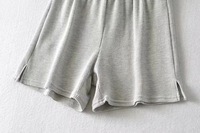 Shorts amples en tissu gaufré uni à taille haute pour femmes, avec fente latérale, par un fournisseur de vêtements de rue