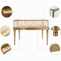 Table de présentation de bijoux en or champagne sur mesure avec éclairage LED, vitrine en verre pour magasin de bijoux