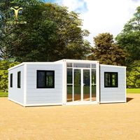 Petite maison de conteneur extensible avec remorque sur roues